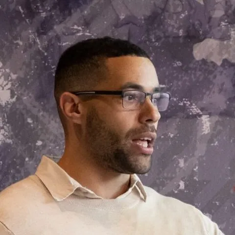 Anthony Richardson, founder of Sorted Platforms, wearing glasses and a cream jumper